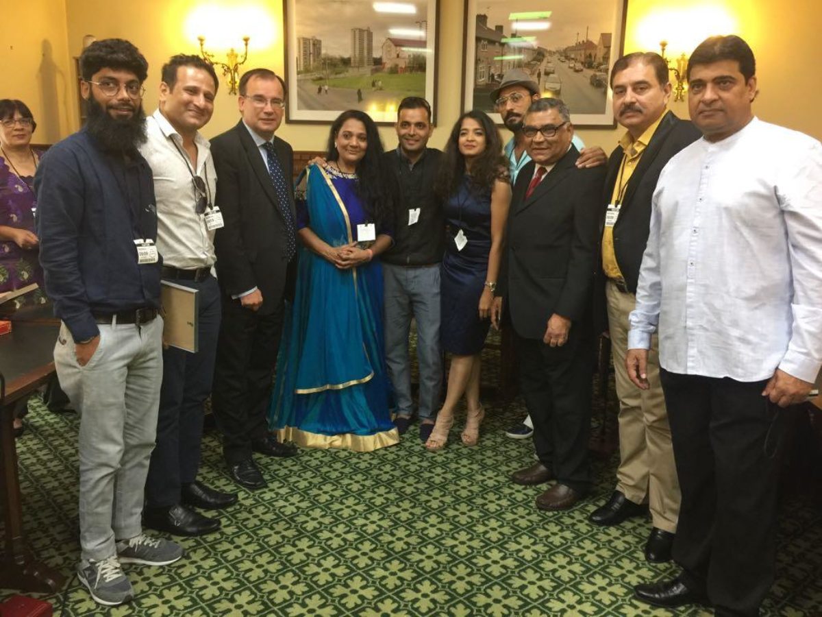 Gareth meets with members of the Gujarati community