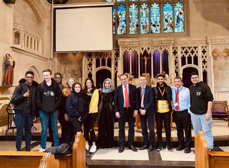 Gareth Thomas MP with students and staff from St Dominic