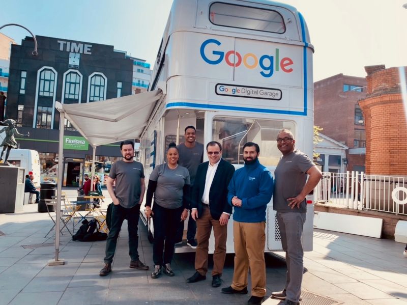 Gareth Thomas MP and Google Trainers outside Digital Garage bus on St Ann’s Road 